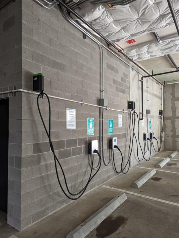 SemaConnect Blink EVSE chargers with cable management washington parking garage